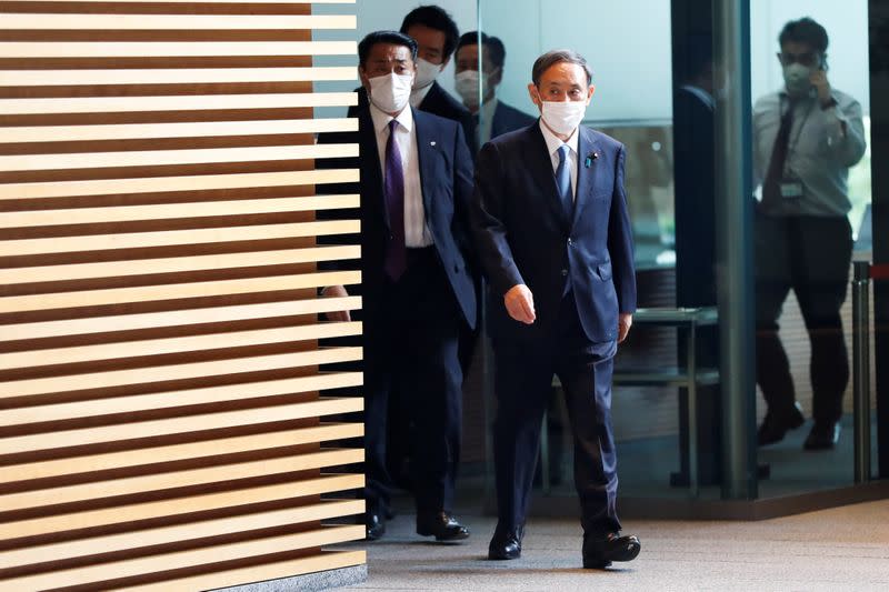 Japan's Chief Cabinet Secretary Yoshihide Suga enters prime minister’s official residence in Tokyo