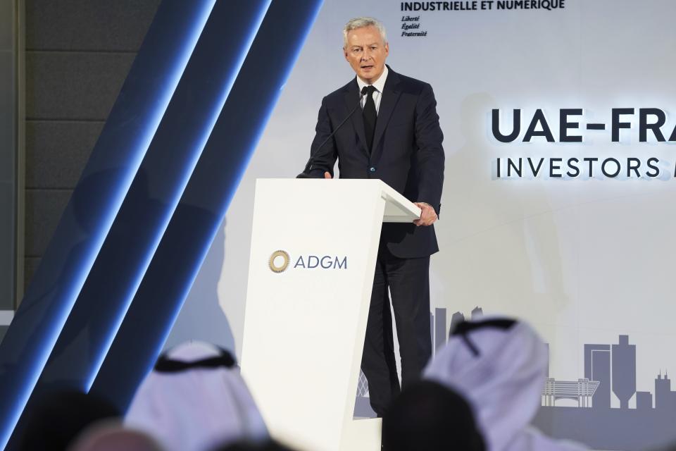French Finance Minister Bruno Le Maire speaks at a conference in Abu Dhabi, United Arab Emirates, Monday, Jan. 30, 2023. Le Maire said Monday that pension reforms being pushed by French President Emmanuel Macron were necessary despite facing protests and growing opposition back home. (AP Photo/Jon Gambrell)