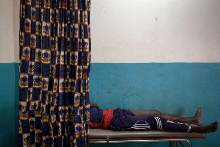 A young man wounded by gunshot is treated at hospital in Paoua, now home to between 15,000 and 17,000 displaced people