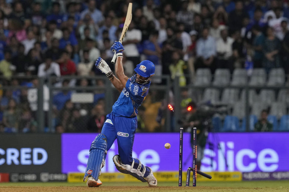 Mumbai Indians' Tilak Varma is bowled out by Punjab Kings' Arshdeep Singh during the Indian Premier League cricket match between Mumbai Indians and Punjab Kings in Mumbai, India, Saturday, April 22, 2023. (AP Photo/Rajanish Kakade)