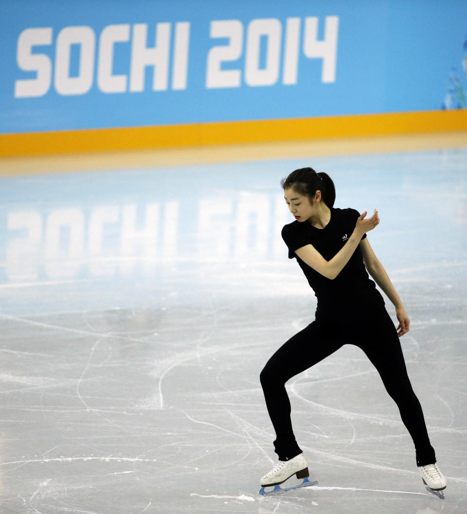 Yuna Kim of South Korea performs during the practice session at Iceberg Skating Palace at the 2014 Winter Olympics, Tuesday, Feb. 18, 2014, in Sochi, Russia. (AP Photo/David Goldman)