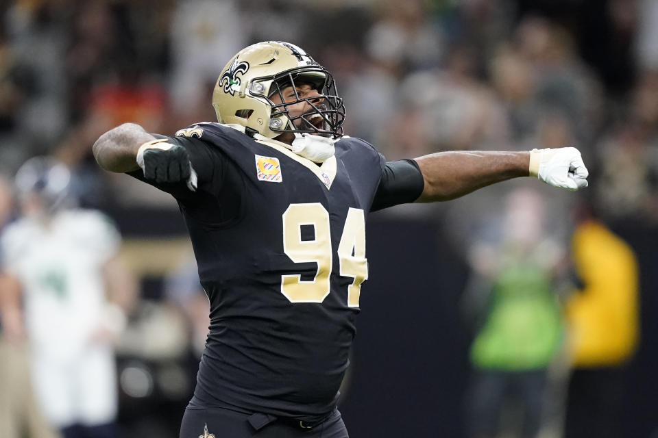 New Orleans Saints defensive end Cameron Jordan celebrates his sack of Seattle Seahawks quarterback Geno Smith during an NFL football game in New Orleans, Sunday, Oct. 9, 2022. (AP Photo/Gerald Herbert)