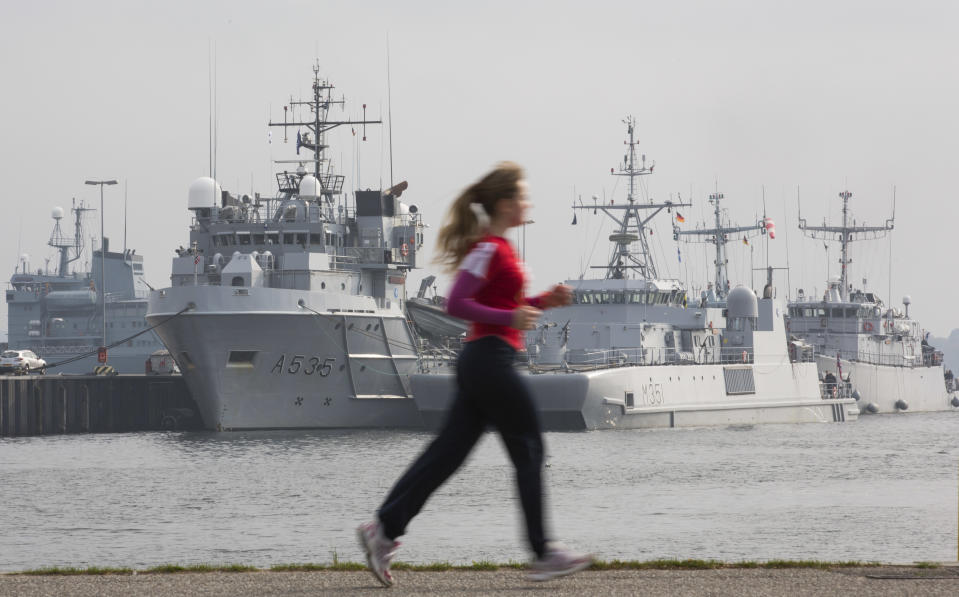 The warships of the standing NATO Mine Counter-Measures Group ONE with Norwegian support vessel Valkyrien, Norwegian minesweeper Otra and Dutch minehunter Makkum, from left, wait to set sail from Kiel, Germany, Tuesday, April 22, 2014. The group is one of NATO’s four standing Maritime Forces and deploys to the Baltic Sea to enhance maritime security and readiness in the region. The maritime Group was reactivated by a North Atlantic Council decision to enhance collective defense and assurance measures in response to the crisis in Ukraine. (AP Photo/Gero Breloer)