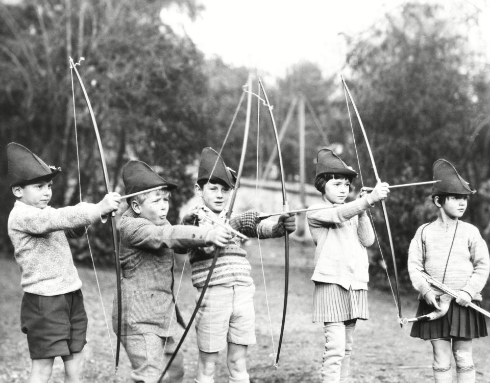 Prince Philip (second left) taking archery lessons at the MacJannet American school in St CloudEverett/Shutterstock