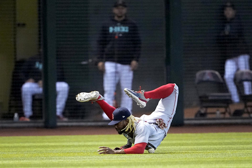 Boston Red Sox Raimel Tapia can't catch a double hit by Arizona Diamondbacks' Jake McCarthy during the fifth inning of a baseball game, Saturday, May 27, 2023, in Phoenix. (AP Photo/Matt York)