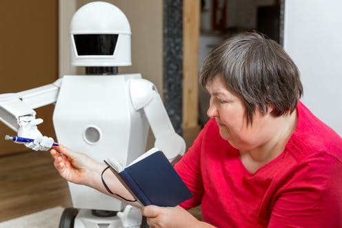 <span class="caption">Social robots are one way to provide lonely seniors with companionship.</span> <span class="attribution"><a class="link " href="https://www.shutterstock.com/image-photo/robot-friend-learning-teaching-mentally-disabled-1113194150?src=AFuOGtVppkajFdkMK1OEpQ-1-6" rel="nofollow noopener" target="_blank" data-ylk="slk:Miriam Doerr Martin Frommherz/ Shutterstock;elm:context_link;itc:0;sec:content-canvas">Miriam Doerr Martin Frommherz/ Shutterstock</a></span>