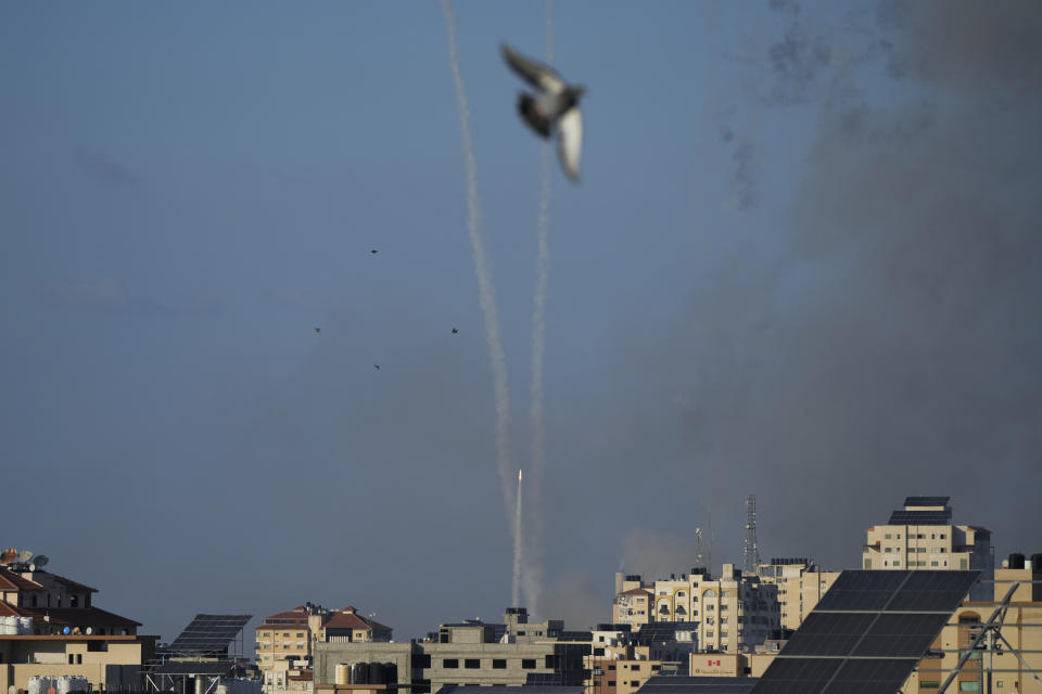 Rockets are fired toward Israel from the Gaza Strip, Tuesday, Oct. 10, 2023. Israel has launched intense airstrikes in Gaza after the territory's militant rulers carried out an unprecedented attack on Israel Saturday, killing over 900 people and taking captives. Hundreds of Palestinians have been killed in the airstrikes. (AP Photo/Hatem Moussa)