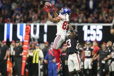 Oct 22, 2018; Atlanta, GA, USA; New York Giants wide receiver Sterling Shepard (87) catches a pass over Atlanta Falcons cornerback Robert Alford (23) in the second quarter at Mercedes-Benz Stadium. Mandatory Credit: Brett Davis-USA TODAY Sports