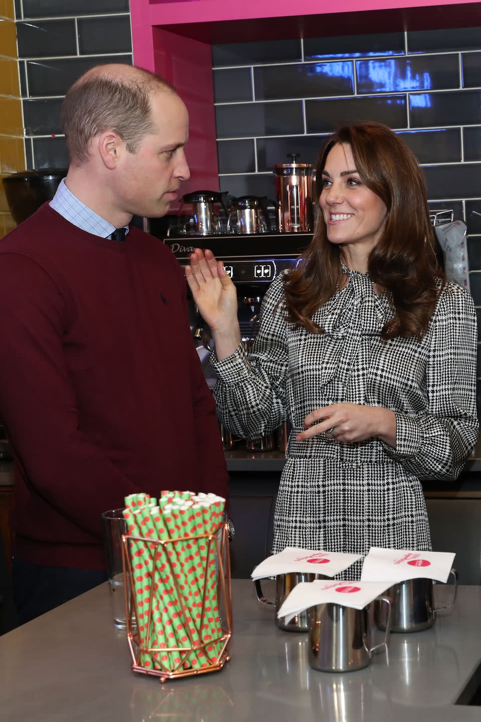 <p>Kate sported a houndstooth plaid dress during a visit to Bradford, where she and Prince William made milkshakes.</p>