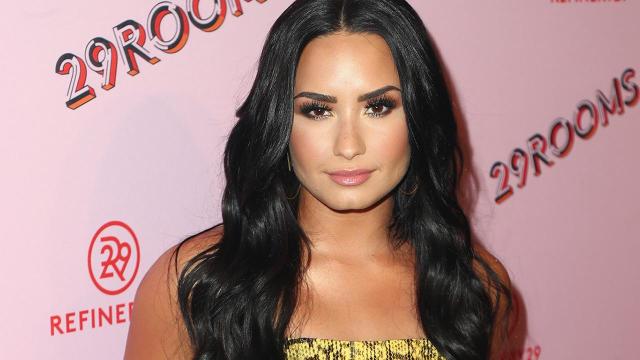 Demi Lovato risks NIP SLIP as she squeezes best assets into plunging pink  swimsuit, Celebrity News, Showbiz & TV