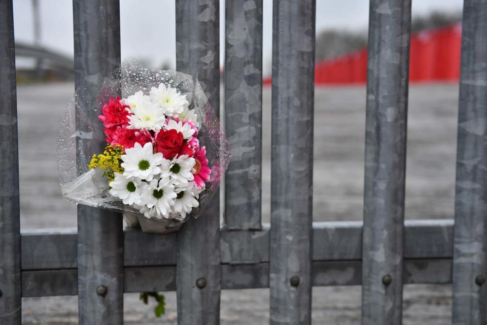 Flowers were left outside Alfreton Town Football Club from where Mr Sinnott was on loan (PA)