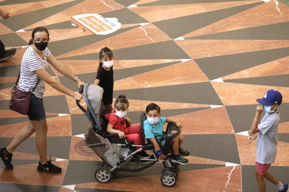 A woman and her children at Union Station