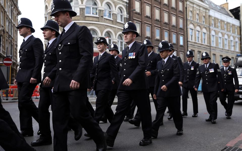 Police officers arrive in Southwark for the funeral of Pc Keith Palmer  - Credit: Dan Kitwood/Getty