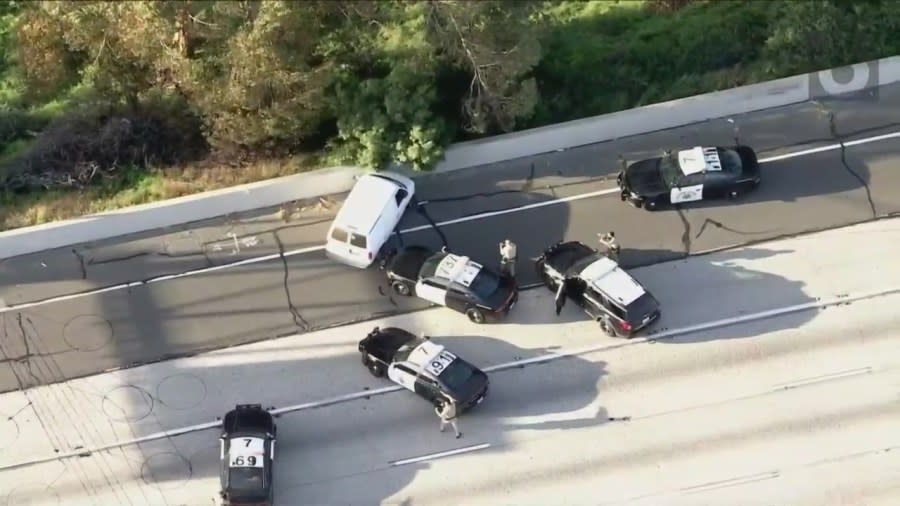 Several non-lethal rounds were fired into the van's passenger side window on the 91 Freeway. (KTLA)