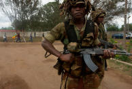 <p>Zimbabwean soldiers patrol as people take part in a demonstration demanding the resignation of Zimbabwe’s president on Nov. 18, 2017 in Harare. (Photo: AFP/Getty Images) </p>