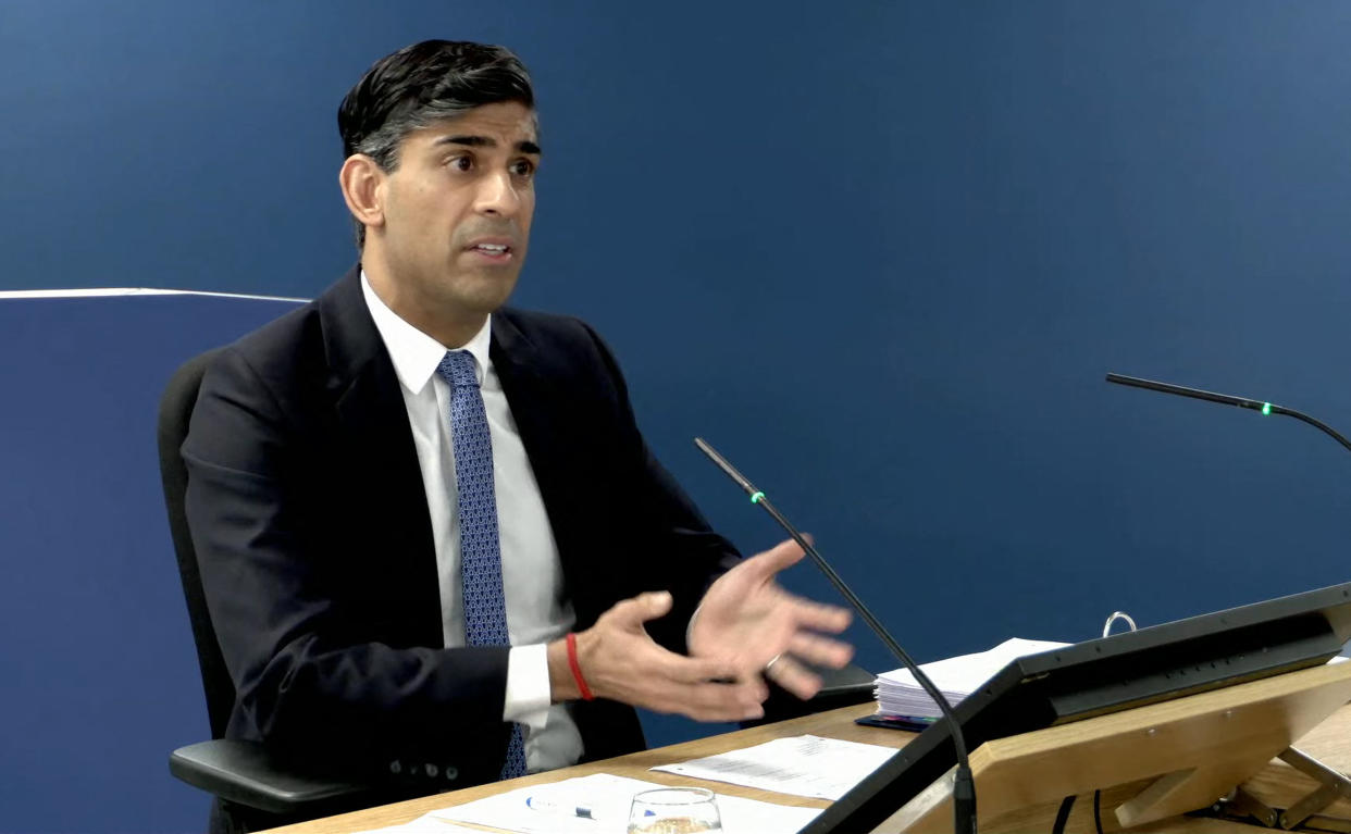 A video grab from footage broadcast by the UK Covid-19 Inquiry shows Britain's Prime Minister Rishi Sunak giving evidence at the UK Covid-19 Inquiry, in west London, on December 11, 2023. Sunak faced questions Monday over whether his 