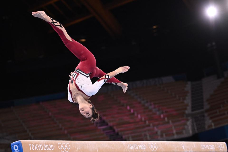 Germany's Pauline Schaefer-Betz competes in the artistic gymnastics balance beam event of the women's qualification during the Tokyo 2020 Olympic Games at the Ariake Gymnastics Centre in Tokyo on July 25, 2021. / Credit: LIONEL BONAVENTURE/AFP via Getty Images