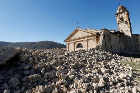 Saint Anthony church is seen partially collapsed following an earthquake along the road to Norcia, Italy, October 30, 2016. REUTERS/Remo Casilli