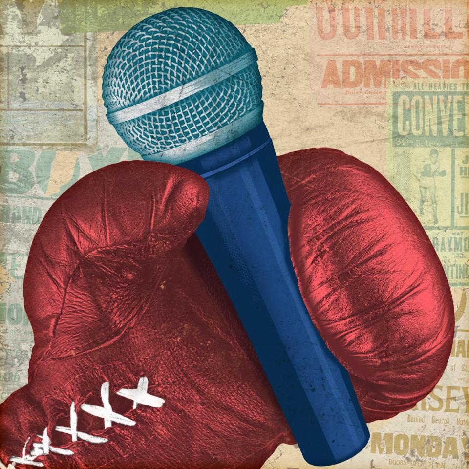 A boxing glove holding a microphone