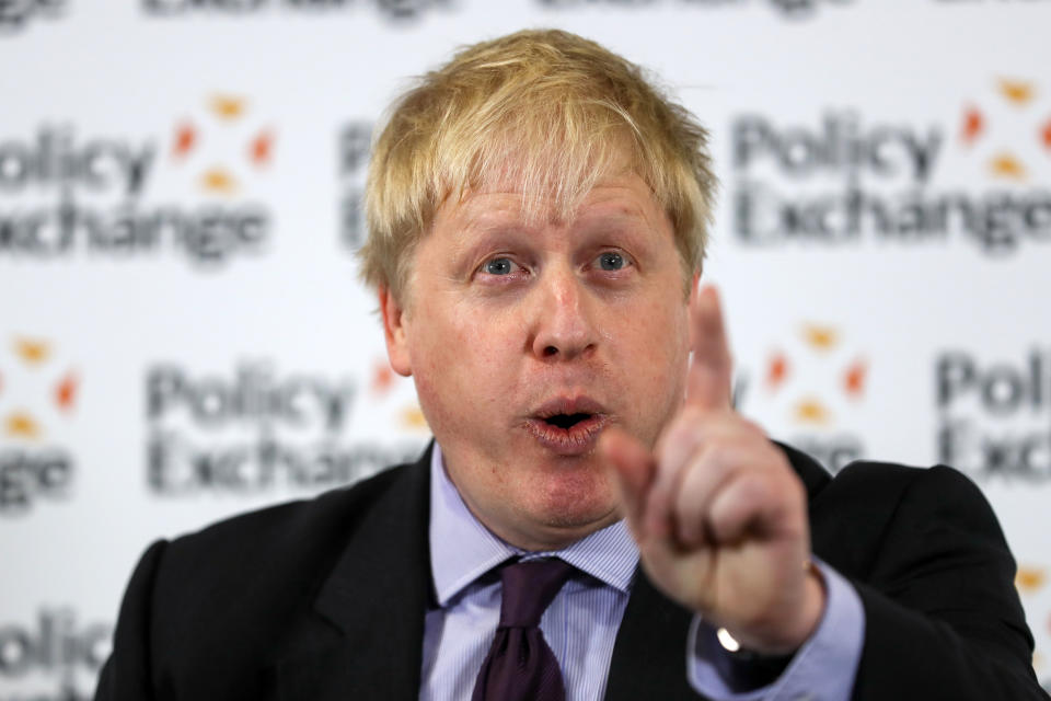 Britain's Foreign Secretary Boris Johnson delivers a speech at the Policy Exchange in London, Wednesday Feb. 14, 2018. The Foreign Office says Johnson will use a speech Wednesday to argue for "an outward-facing, liberal and global Britain" after the U.K. leaves the bloc. (Simon Dawson/Pool via AP)