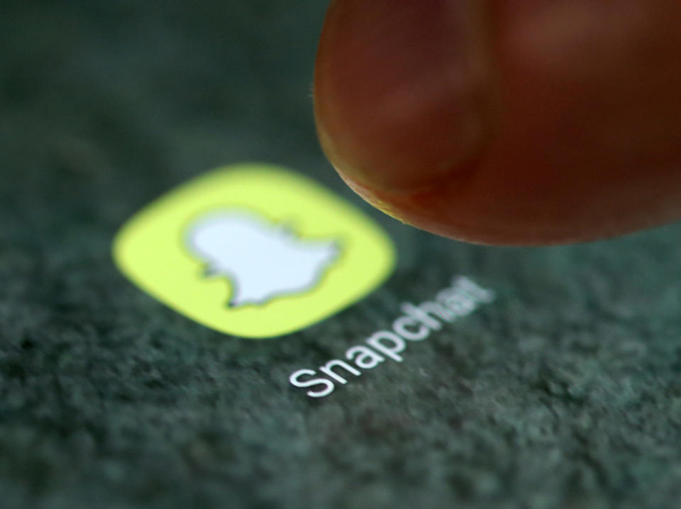 The Snapchat app logo is seen on a smartphone in this picture illustration taken September 15, 2017. REUTERS/Dado Ruvic