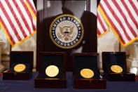 Congressional Gold Medals are placed before a ceremony honoring law enforcement officers who defended the U.S. Capitol on Jan. 6, 2021, in the U.S. Capitol Rotunda in Washington, Tuesday, Dec. 6, 2022. (AP Photo/Alex Brandon)