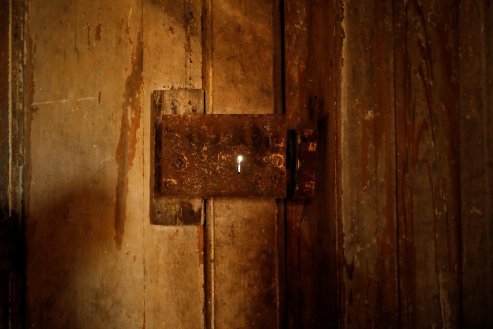 Daylight filters through a lock inside the court at the Seriki Abass Slave Museum in the historic slave port of Badagry, Nigeria. (Photo: Afolabi Sotunde/Reuters)