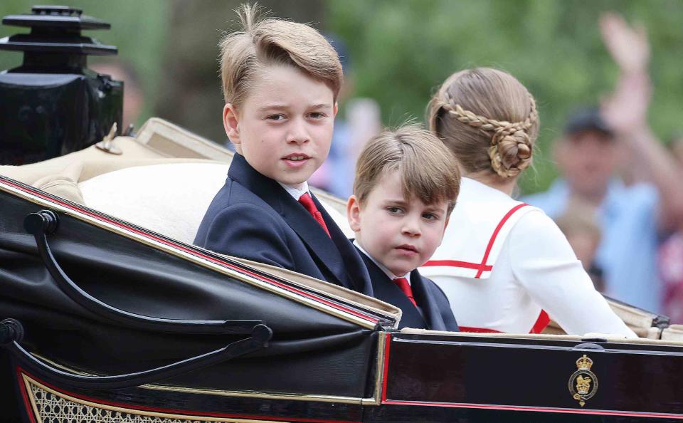 <p>Neil Mockford/Getty </p> Prince George and Prince Louis