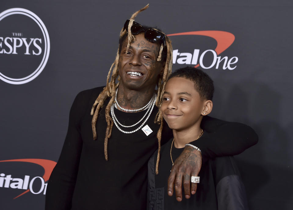 Lil Wayne, left, and Kameron Carter arrive at the ESPY Awards on Wednesday, July 20, 2022, at the Dolby Theatre in Los Angeles. (Photo by Jordan Strauss/Invision/AP)
