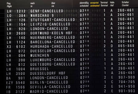 Cancelled flights are seen on a display as passenger security checkpoints are closed during a strike over higher wages at Germany's largest airport in Frankfurt, Germany, January 15, 2019. REUTERS/Kai Pfaffenbach