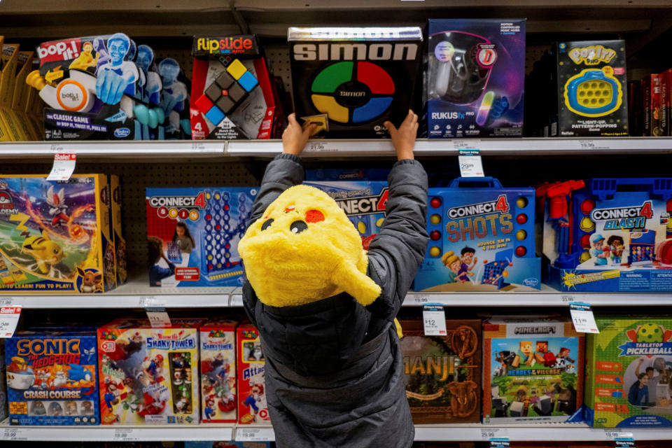 A child looks at toys in a Target store ahead of the Thanksgiving holiday and traditional Black Friday sales in Chicago, Illinois, U.S. November 21, 2023.  REUTERS/Vincent Alban     TPX IMAGES OF THE DAY