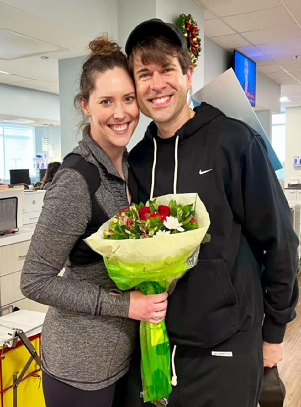 When Kristina Kelly finished chemotherapy to treat her stage 3 colorectal cancer, she rang the bell and then celebrated with husband Sean. She still needs to undergo radiation so she's not finished with treatment, but her tumor is responding well so far. (Courtesy Kristina Kelly)