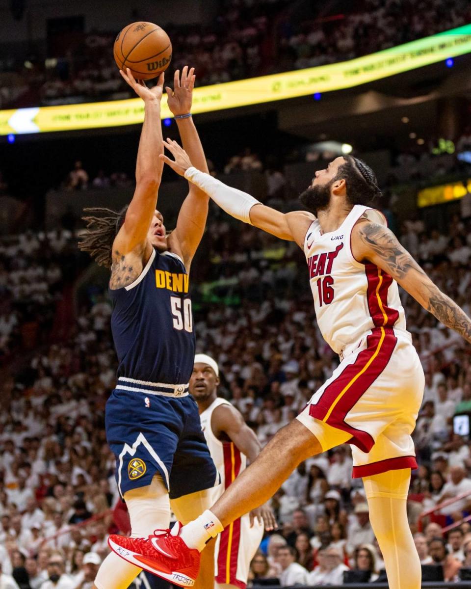 Denver Nuggets forward Aaron Gordon (50) shoots over Miami Heat forward Caleb Martin (16) during the first half of Game 4 of the NBA Finals at the Kaseya Center on Friday, June 9, 2023, in downtown Miami, Fla.