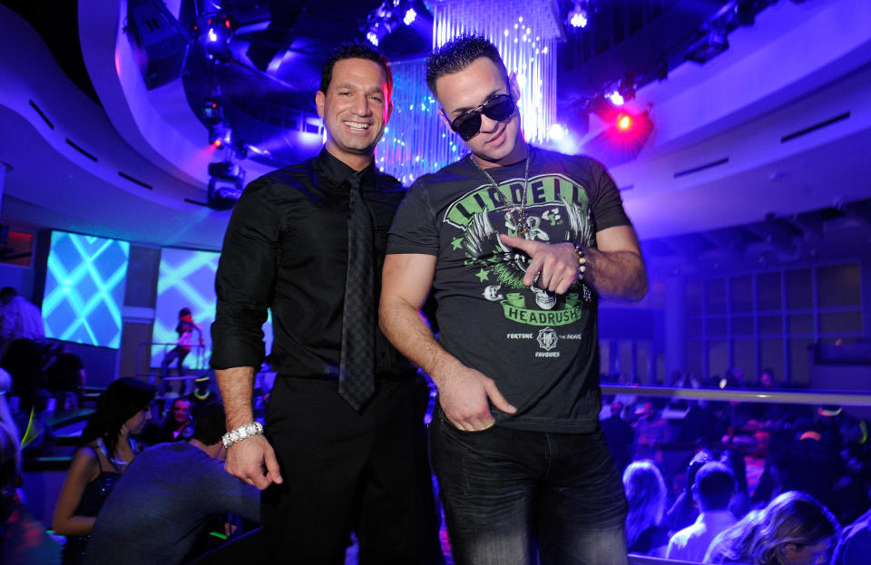 Marc Sorrentino, left, and Mike "The Situation" Sorrentino, right, at a nightclub in Las Vegas on Feb. 14, 2012. (David Becker via Getty Images)