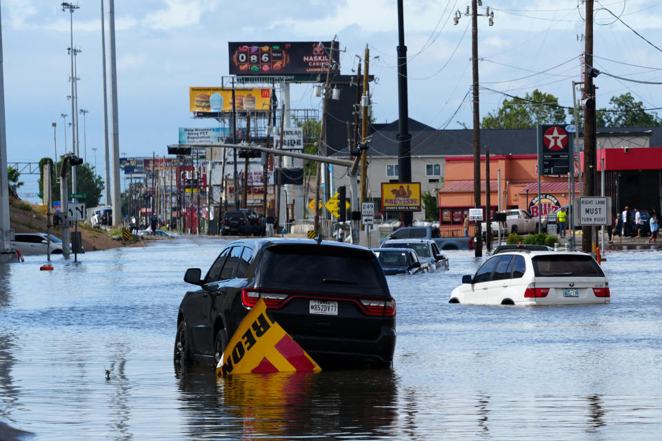 Cars are submerged in flood waters after Hurricane Beryl passed in Houston, Texas, U.S. July 8, 2024. REUTERS/Rich Matthews