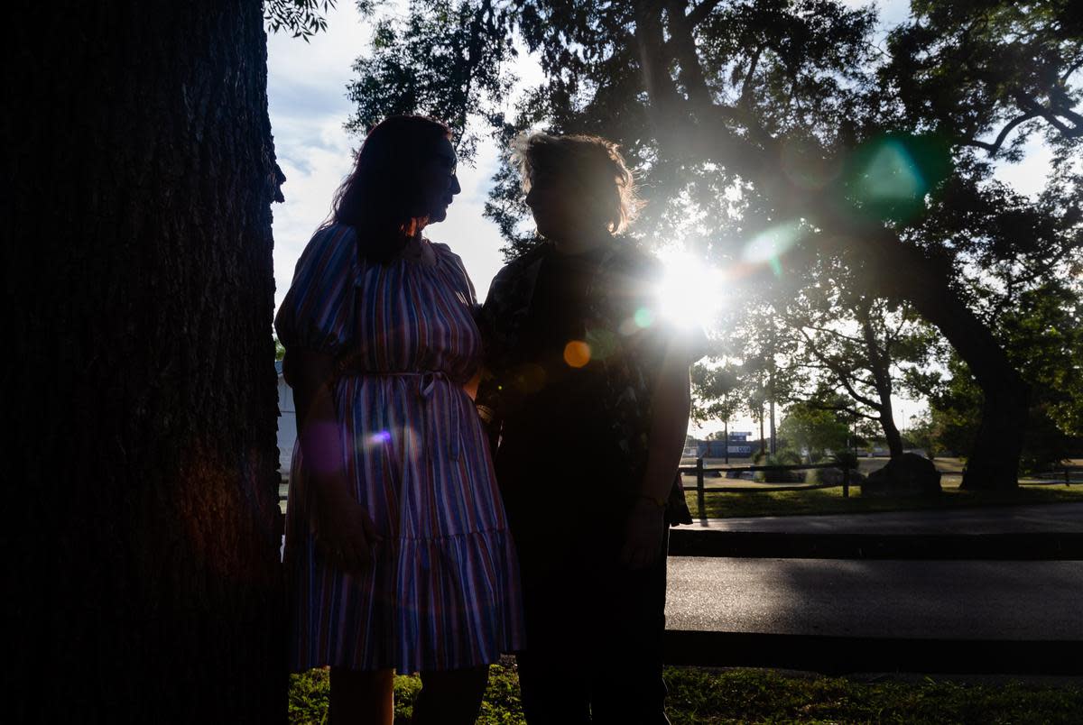 Kari stands with her son, a 17-year-old trans kid, during golden hour at a park in Georgetown on June 30, 2023. As of September 1 of this year, her son will no longer be legally allowed to have gender affirming healthcare and, according to the bill, will have to be “weaned off” their hormones in a “medically appropriate” manner. “I would love to ask somebody what is going to change between today and next March? Is my son going to magically change genders? Please let me know where that magic is,” Kari said.