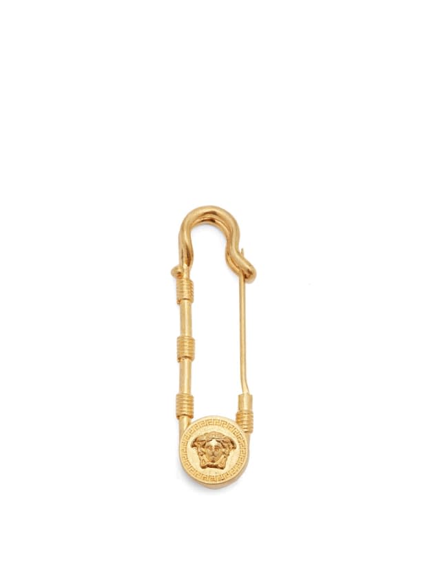 <p>Versace Medusa Brooch, $225, <a href="https://rstyle.me/+aKCr2fA7N9J6E0vX8uZILA" rel="nofollow noopener" target="_blank" data-ylk="slk:available here;elm:context_link;itc:0;sec:content-canvas" class="link ">available here</a>.</p>