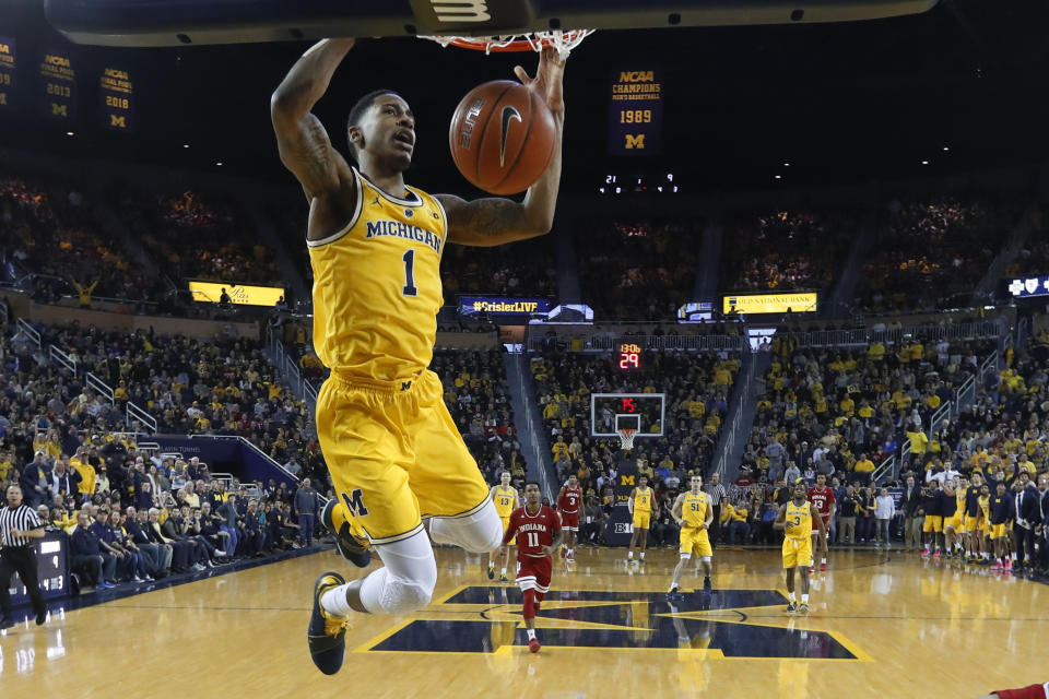 Michigan guard Charles Matthews dunks in the first half of an NCAA college basketball game against Indiana in Ann Arbor, Mich., Sunday, Jan. 6, 2019. (AP Photo/Paul Sancya)
