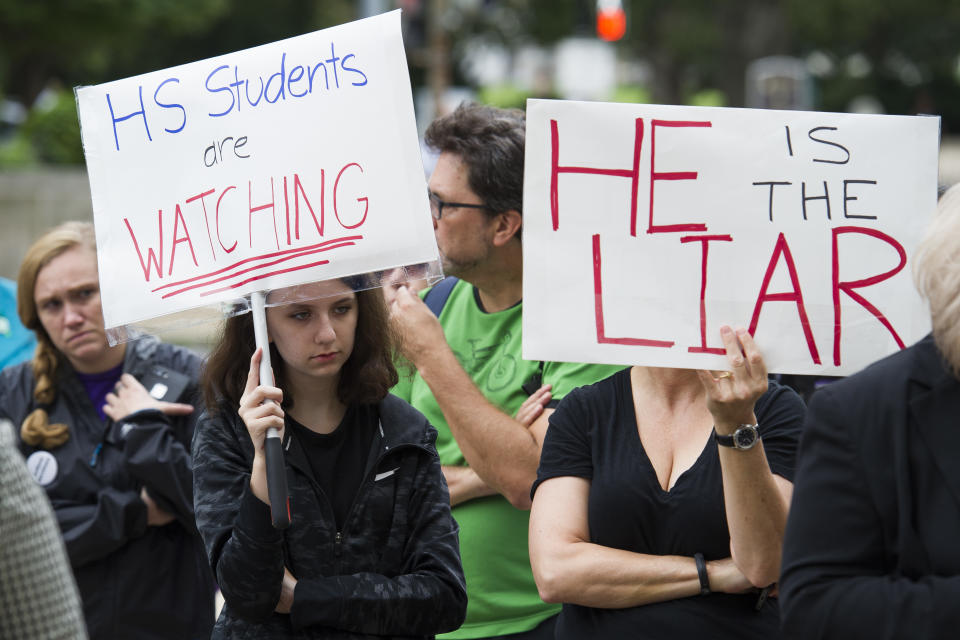 Protesters speak out as Kavanaugh hearing begins