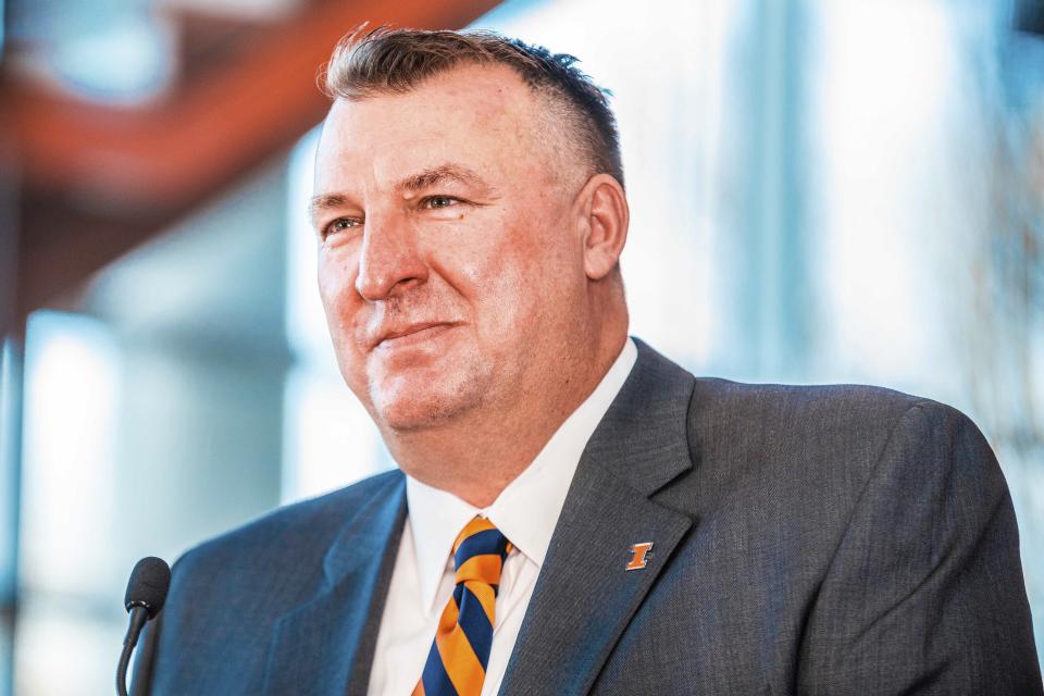 Incoming Illinois football coach Bret Bielema speaks at a news conference at Smith Football Center in Champaign, Ill. Bielema said Monday, Dec. 21, 2020, he hopes to have a coaching staff in place by early January. 2021, and is already concentrating on homegrown recruiting. Bielema, a native of Prophetstown, Ill., replaces Lovie Smith, who went 17-39 overall in his five-year tenure and posted a 10-33 Big Ten record. Bielema's initial contract is for six years beginning with an annual salary of $4.2 million. (Michael Glasgow/University of Illinois Athletics via AP)