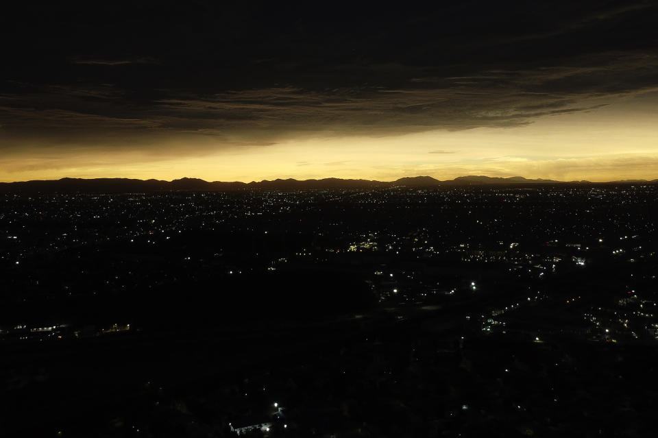 The sky appears to be bathed in ethereal light above Torreon, Mexico.