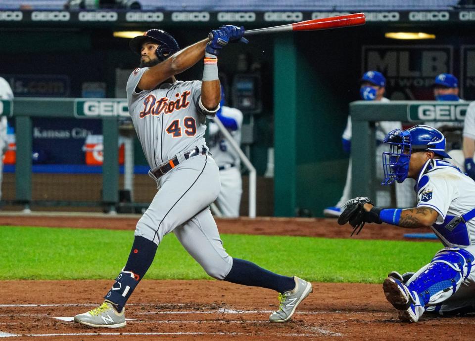 Detroit Tigers shortstop Willi Castro (49) hits a home run against the Kansas City Royals during the third inning at Kauffman Stadium.