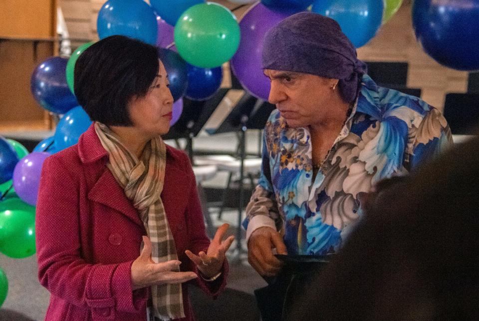 Lincoln Unfired School District board president Sandra Chan, left, talks with Stevie Van Zandt, guitarist for Bruce Springsteen's E Street Band during a visit John McCandless STEM Charter School in Stockton on Mar. 29, 2024. Van Zandt launched the TeachRock education program, which the school employs, that combines music with the teaching of other subjects.