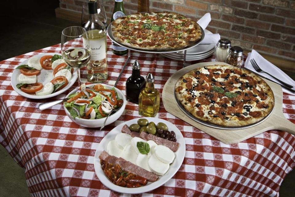 Grimaldi’s menu includes coal-fired pizza, salads and more.