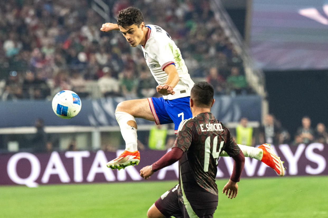 ARLINGTON, TX - MARCH 24: Gio Reyna #7 of United States passes the ball as Erick Sanchez #14 of Mexico looks on during the the CONCACAF Nations League Final match at AT&T Stadium on March 24, 2024 in Arlington, Texas.  The United States won the match 2-0 (Photo by Shaun Clark/ISI Photos/Getty Images)