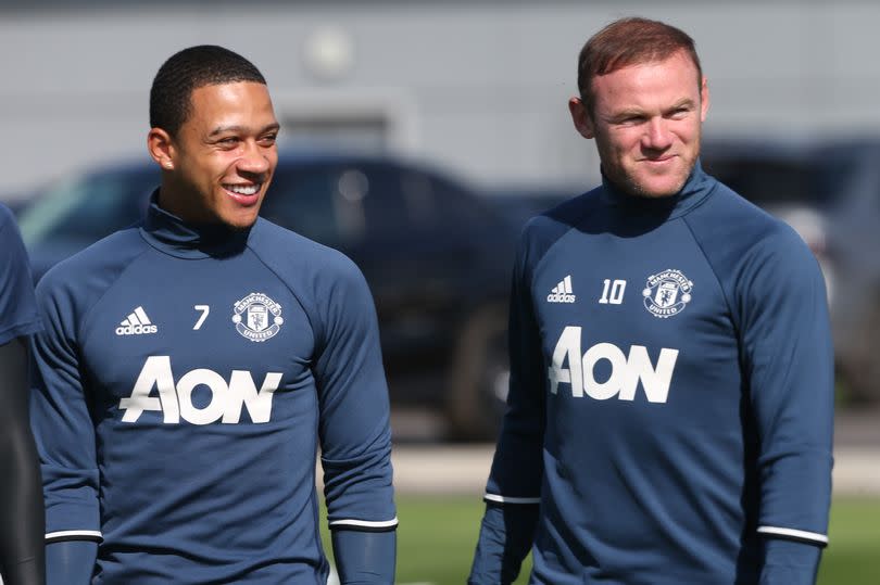 Memphis Depay and Wayne Rooney pictured at Manchester United's Carrington training ground