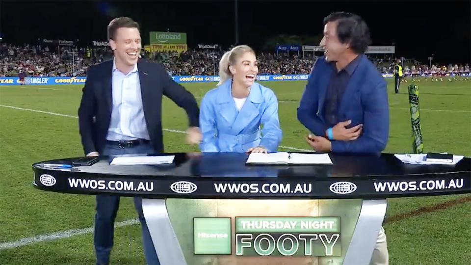 James Bracey and Allana Ferguson, pictured here revealing the gag to Johnathan Thurston.