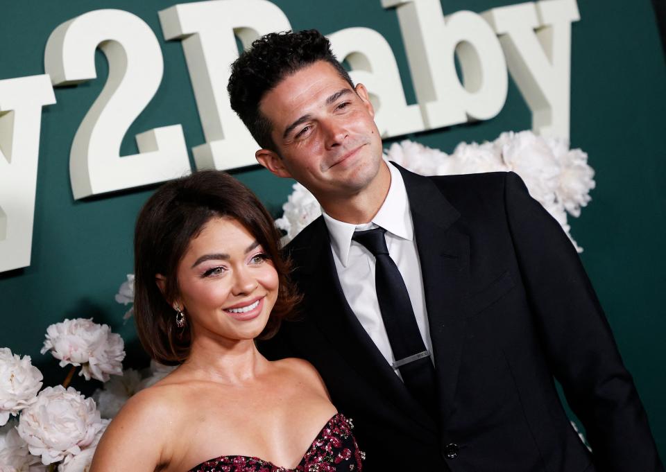 US actress Sarah Hyland (L) and husband Wells Adams arrive for the 2023 Baby2Baby Gala in Los Angeles, California, on November 11, 2023. This year's gala honors Mexican-US actress Salma Hayek Pinault. (Photo by Michael Tran / AFP) (Photo by MICHAEL TRAN/AFP via Getty Images) ORIG FILE ID: AFP_343B4V4.jpg