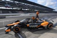 Pato O'Ward, of Mexico, leaves the pits during a practice session for the Indianapolis 500 auto race at Indianapolis Motor Speedway, Friday, May 17, 2024, in Indianapolis. (AP Photo/Darron Cummings)