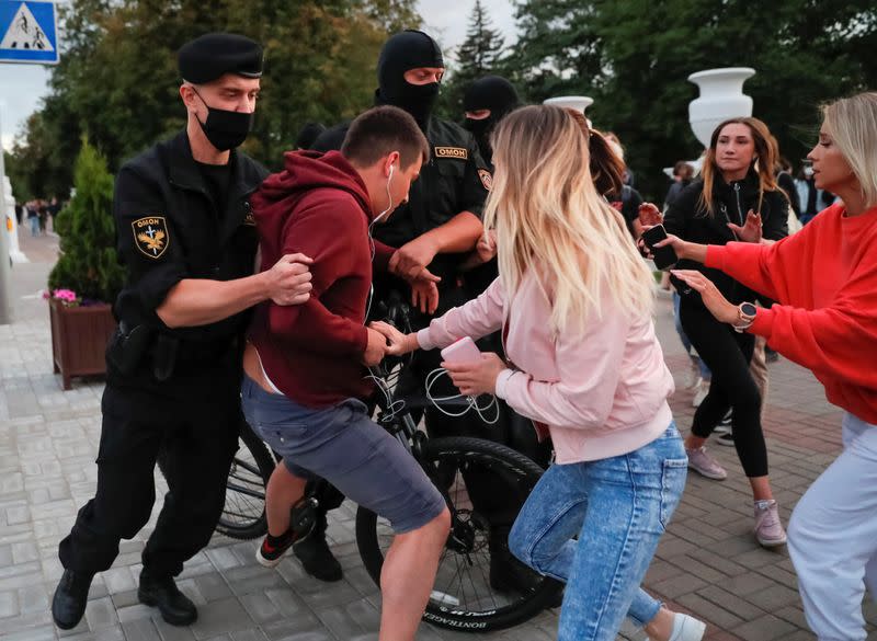 Law enforcement officers detain participants of a protest after the Belarusian election commission refused to register Viktor Babariko and Valery Tsepkalo as candidates for the upcoming presidential election in Minsk